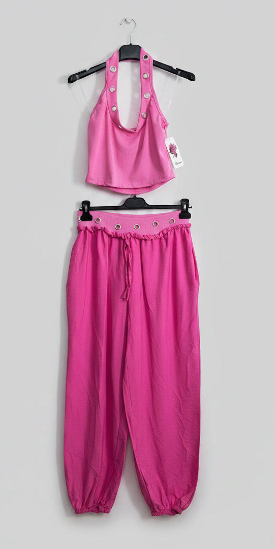 Coordinato rosso con occhielli – top halter e pantaloni