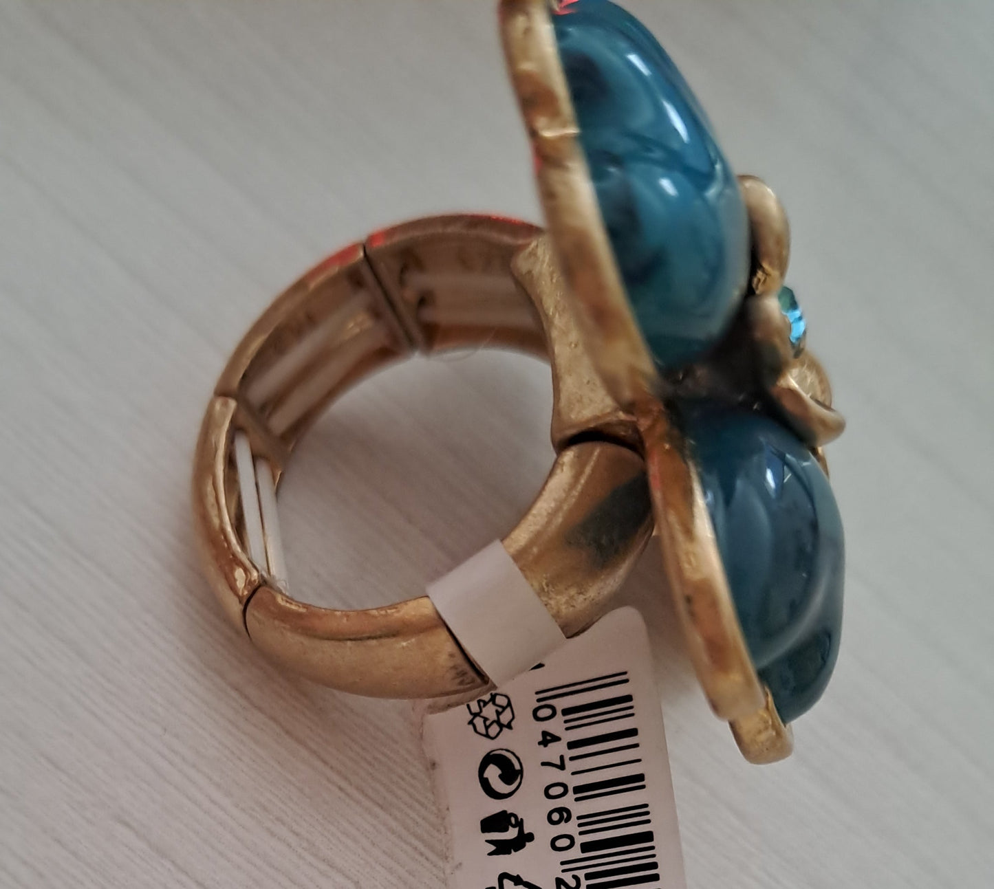 Anello con elastico adattabile quadrifoglio smeraldo e fiore dorato