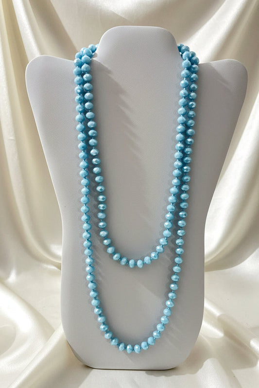 Collana lunga azzurra di cristalli sfaccettati