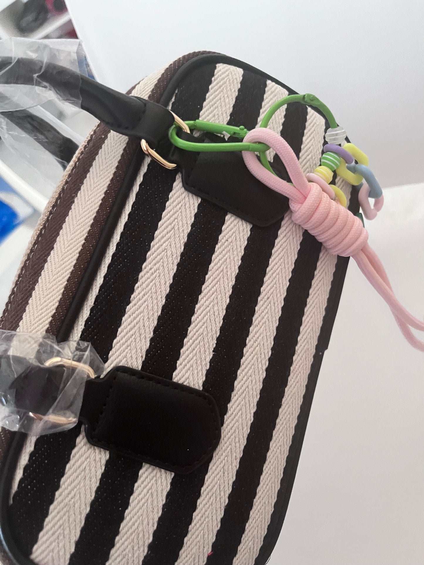 Mini bowling bag a righe con charm