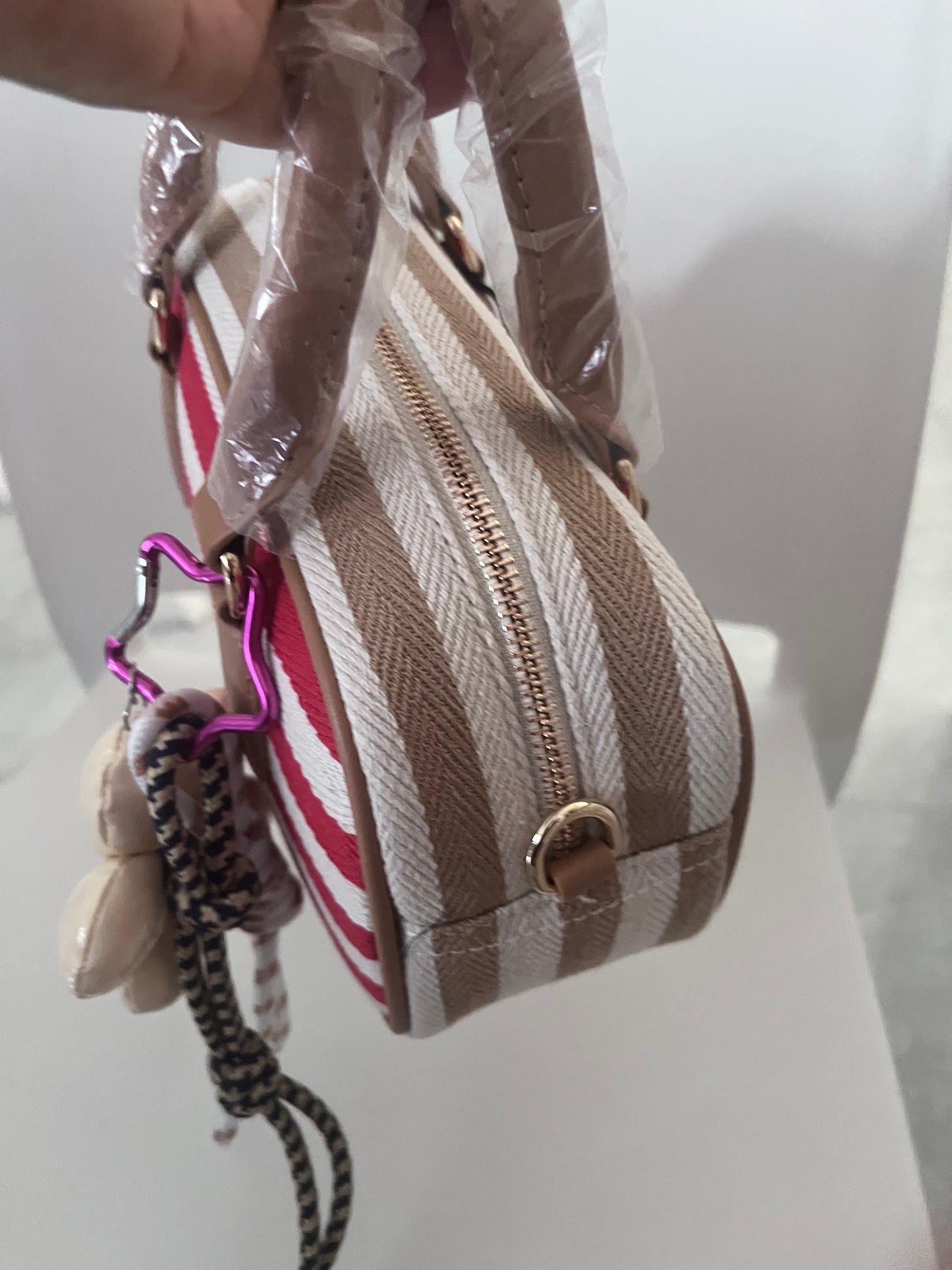 Mini bowling bag a righe con charm