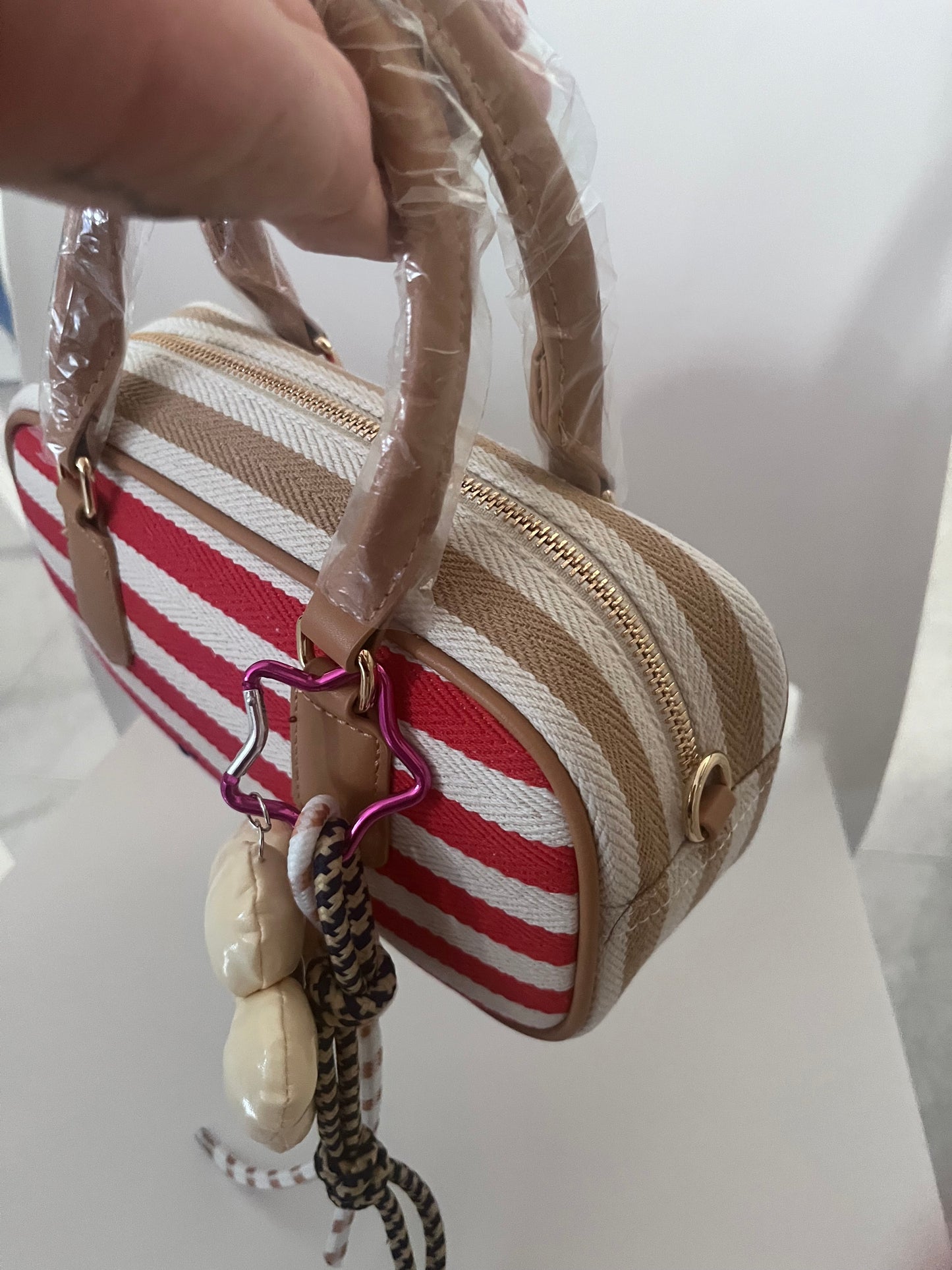 Mini bowling bag a righe con charm