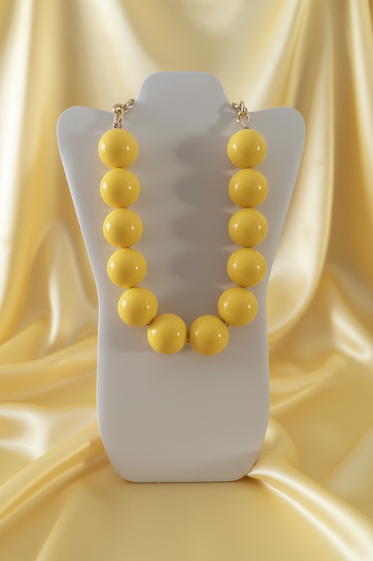 Collana a sfere gialle