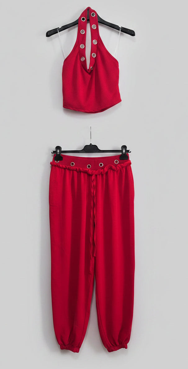 Coordinato rosso con occhielli – top halter e pantaloni