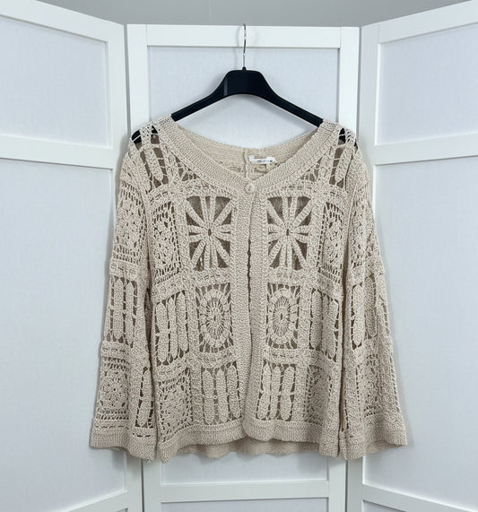 Top in crochet panna con motivi geometrici e floreali