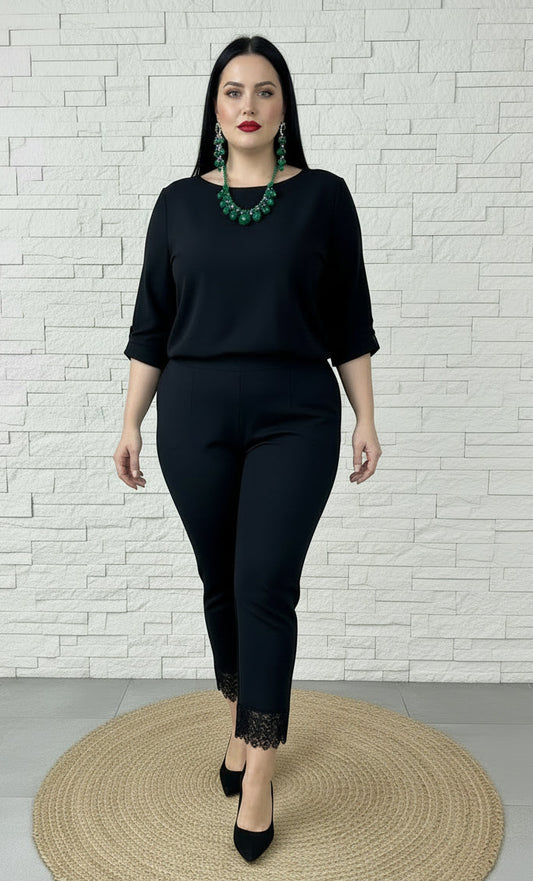 Pantalone nero slim con orlo in pizzo