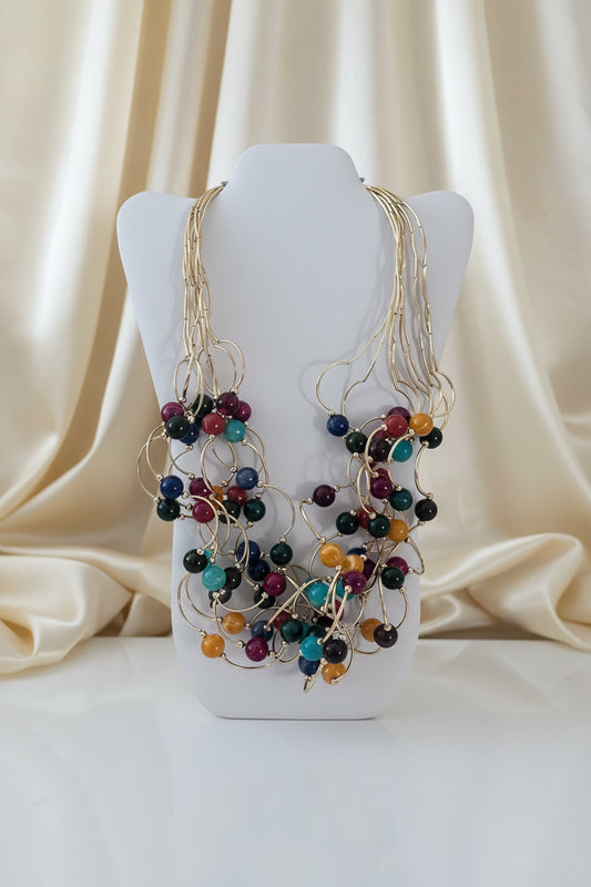 Collana multifilo dorata con perle colorate