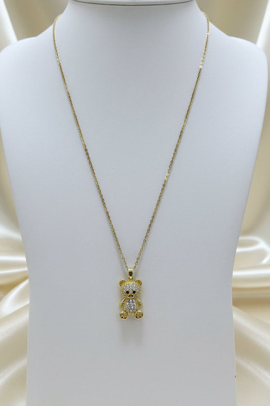 Collana orsetto teddy bear dorato con strass su espositore bianco