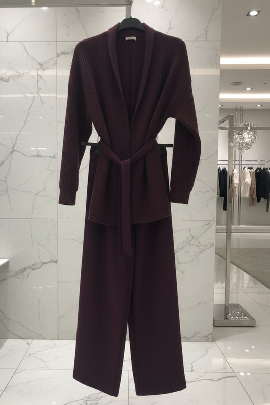 Completo due pezzi prugna scuro con giacca a revers cintura e pantalone palazzo