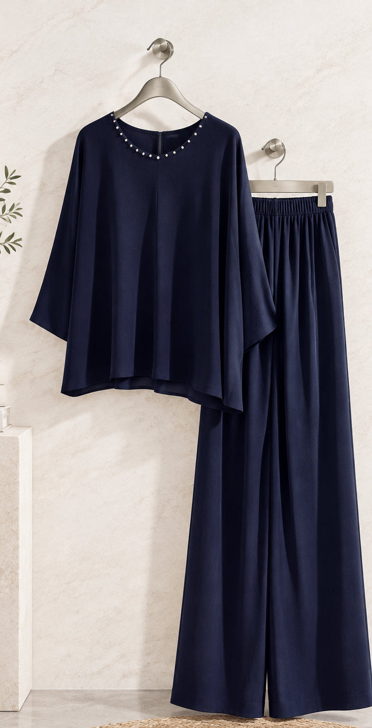 Completo blu scuro con maglia a scollo decorato e pantaloni ampi