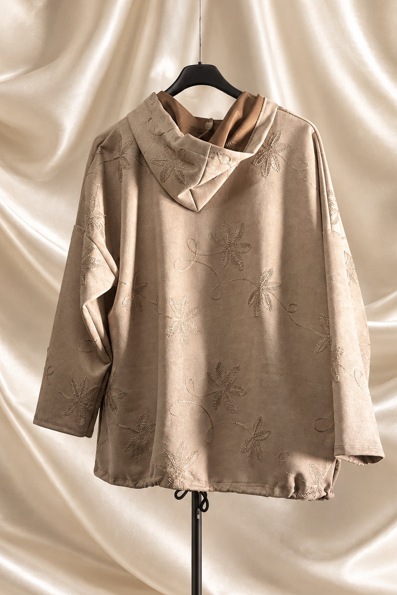 Giacca beige con cappuccio e motivi floreali, vista dietro